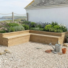 Grande letto rialzato a forma di L con seduta / 3,75 x 3,75 x 0,65 m